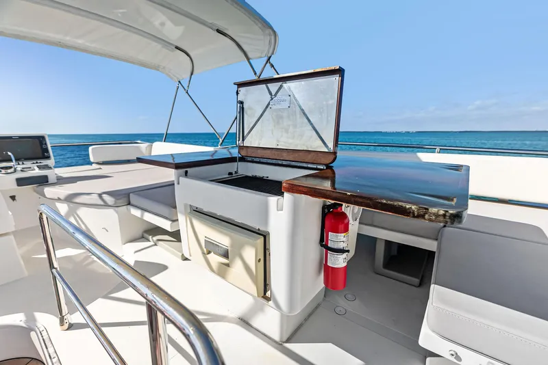 Slide: The Image of Azimut 45 Fly 2014 yacht deck with seating, grill, and ocean view. - 28