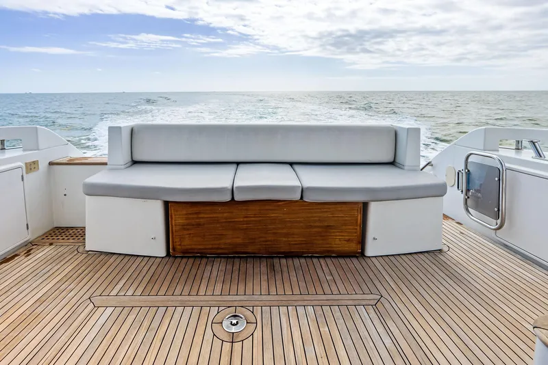 Slide: The Image of Azimut 45 Fly 2014 yacht deck with cushioned seating, ocean view. - 29