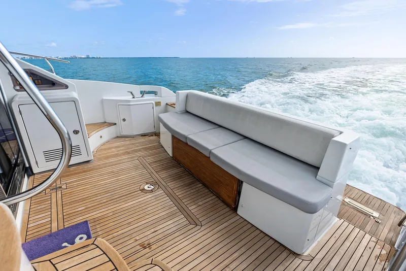 Slide: The Image of Azimut 45 Fly 2014 yacht deck with seating, cruising on open water. - 30