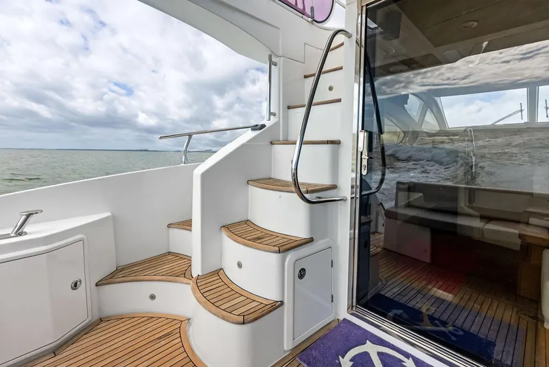 Slide: The Image of Azimut 45 Fly 2014 yacht with elegant wooden stairs and ocean view. - 31