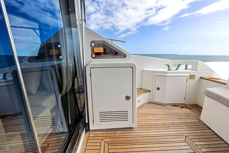 Slide: The Image of Azimut 45 Fly 2014 yacht deck with wooden flooring and ocean view. - 32