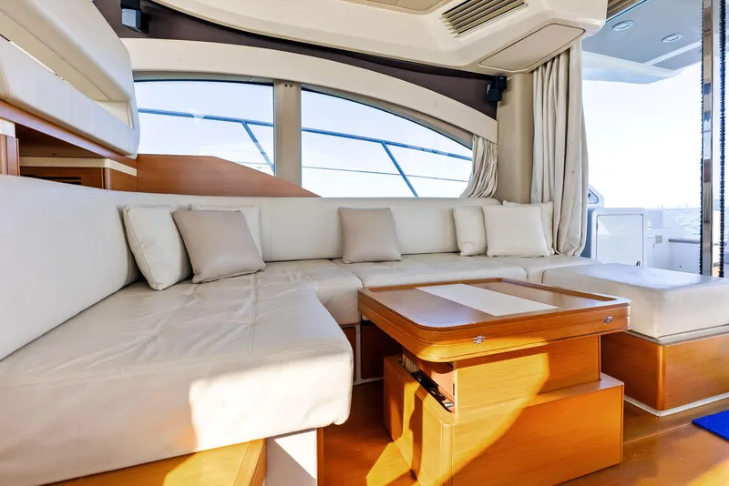 Slide: The Image of Luxurious interior of 2014 Azimut 45 Fly yacht with elegant seating and wooden accents. - 35