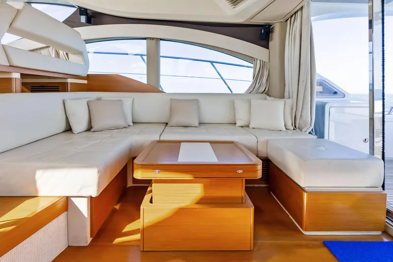 Slide: The Image of Luxurious interior of 2014 Azimut 45 Fly yacht with elegant seating and wooden accents. - 37