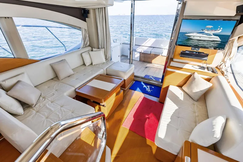 Slide: The Image of Luxurious interior of 2014 Azimut 45 Fly yacht with plush seating and ocean view. - 38