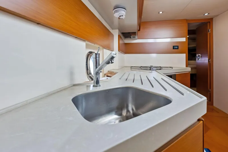 Slide: The Image of Modern kitchen interior of 2014 Azimut 45 Fly yacht with sleek sink and countertop. - 47