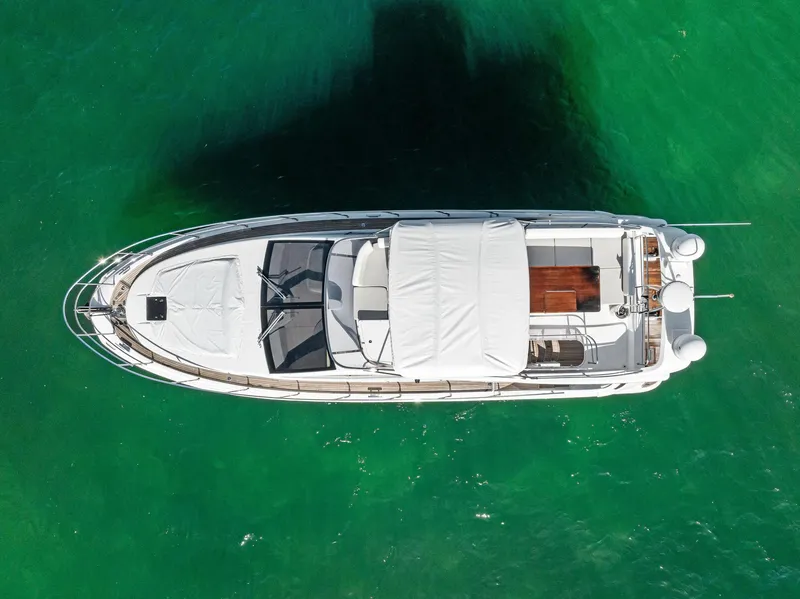 Slide: The Image of Aerial view of 2014 Azimut 45 Fly yacht on clear green water. - 5