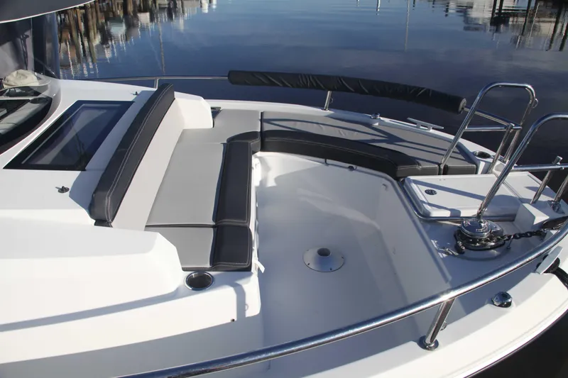 Slide: The Image of 2020 Jeanneau NC Sport 895 boat deck with seating and railing. - 8