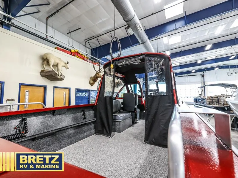 Slide: The Image of 2025 Stryker X220 boat interior at Bretz RV & Marine showroom. - 5