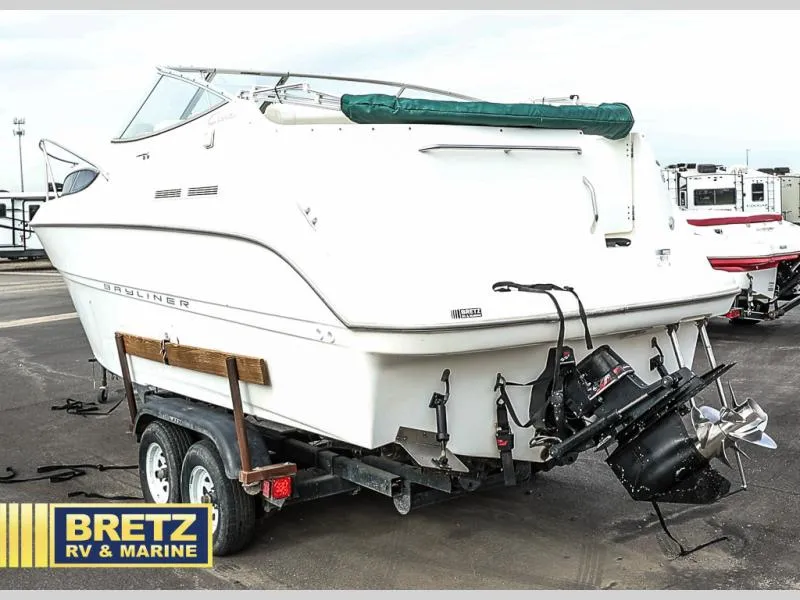 Slide: The Image of 2000 Bayliner 2455 boat on trailer at Bretz RV & Marine dealership. - 6