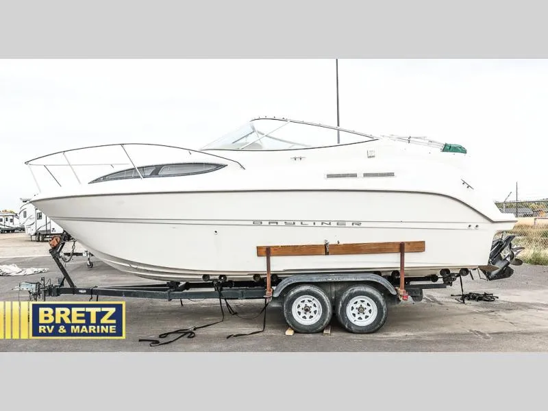 Slide: The Image of 2000 Bayliner 2455 boat on trailer at Bretz RV & Marine dealership. - 7