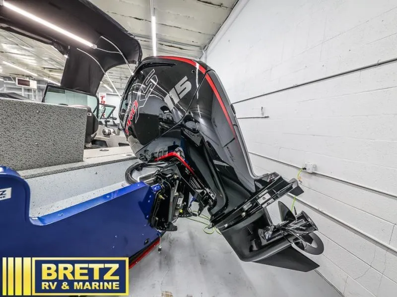 Slide: The Image of 2024 Adventure 1775 Sport boat with powerful outboard motor in showroom. - 7