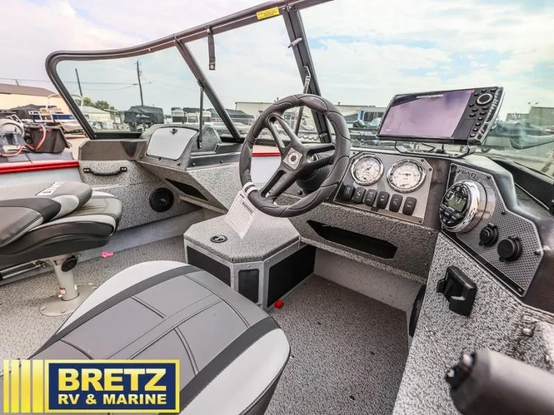 Slide: The Image of 2024 Adventure 1775 Sport boat interior with steering wheel and dashboard at Bretz RV & Marine. - 11