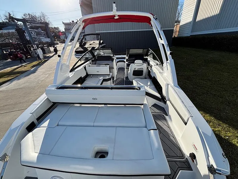 Slide: The Image of 2025 Cobalt R4 Outboard boat with sleek white interior and modern design. - 7