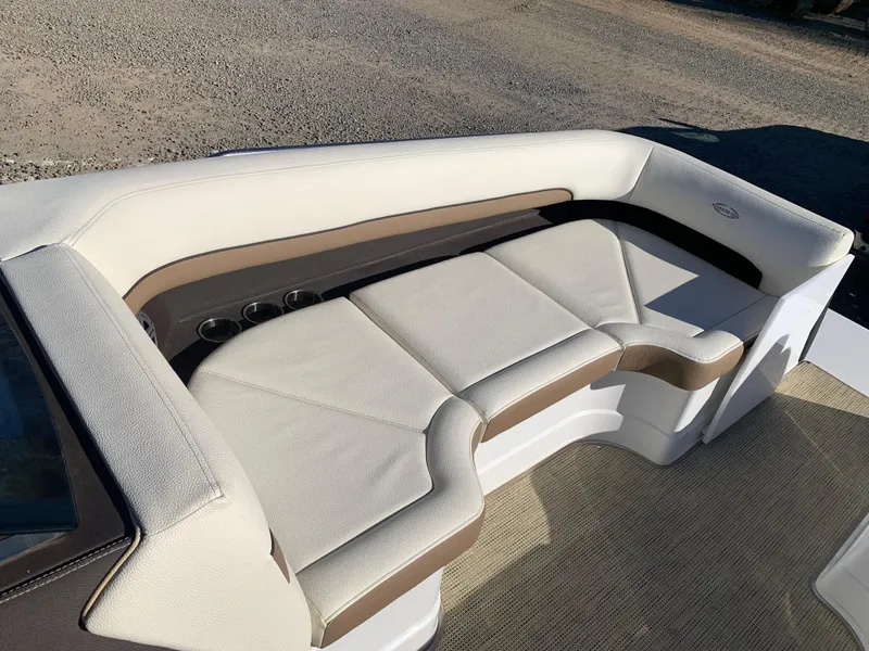 Slide: The Image of Luxurious seating on 2017 Marker One ML4 boat, featuring beige and white upholstery. - 12