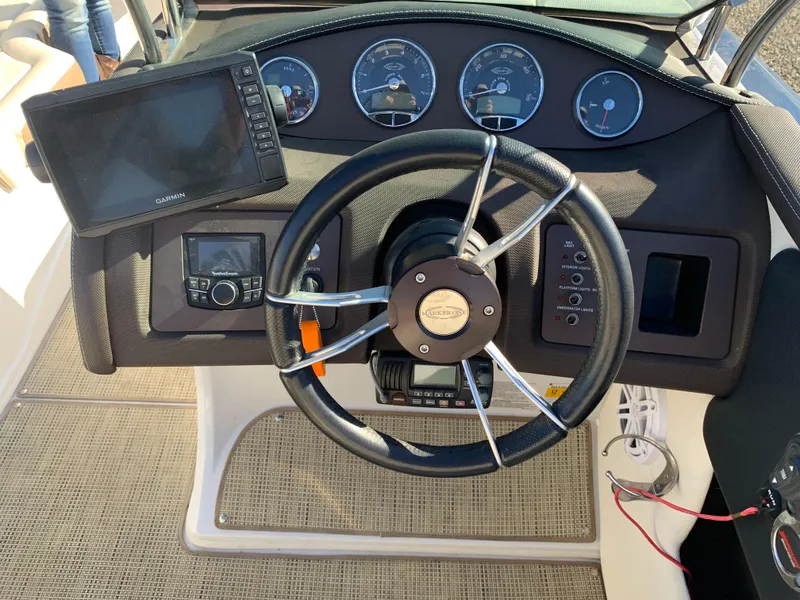 Slide: The Image of Steering wheel and dashboard of 2017 Marker One ML4 boat. - 19
