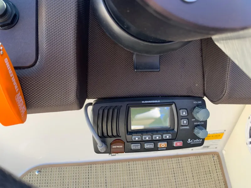 Slide: The Image of Boat dashboard with Cobra marine radio, Marker One ML4, 2017 model. - 20