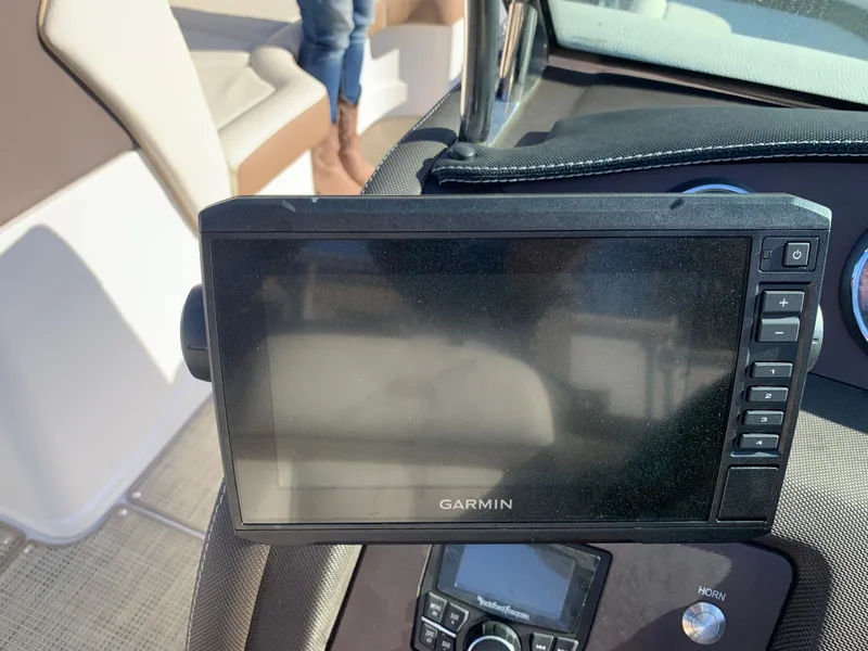 Slide: The Image of Garmin navigation system on 2017 Marker One ML4 boat dashboard. - 21