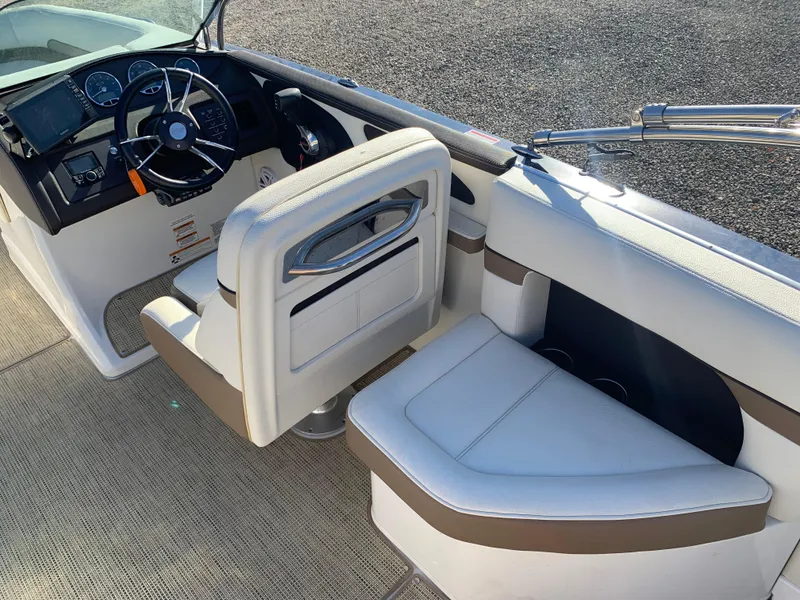 Slide: The Image of Interior of 2017 Marker One ML4 boat with steering wheel and seating. - 23