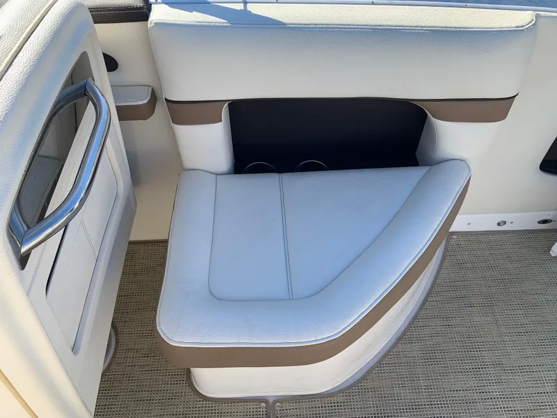 Slide: The Image of Boat seating area with white and brown upholstery, Marker One ML4, 2017 model. - 24