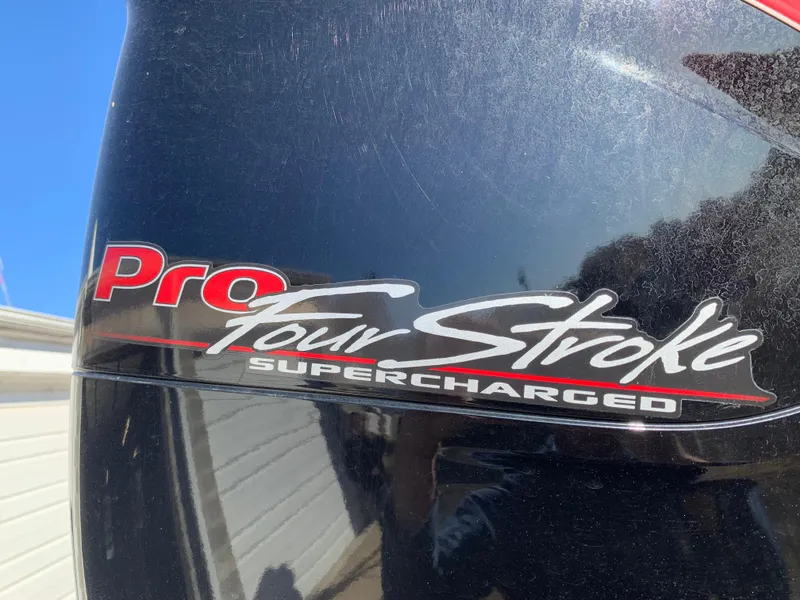 Slide: The Image of Close-up of a 2017 Marker One ML4 Pro Four Stroke Supercharged engine logo. - 26