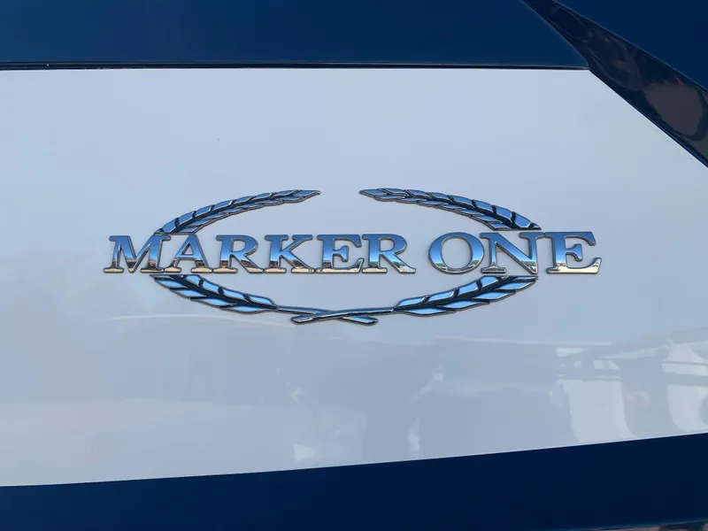 Slide: The Image of Marker One ML4 2017 logo with laurel wreath design on a boat. - 28