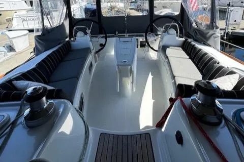 Slide: The Image of Interior view of 2007 Beneteau 49 sailboat cockpit with dual steering wheels. - 25