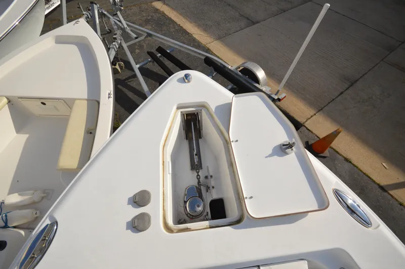 Slide: The Image of 2015 Sea Hunt Gamefish 27 boat anchor compartment and deck view. - 20