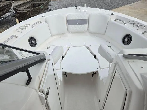 Slide: The Image of 2022 Sea Fox 226 Traveler boat interior with seating and cup holders. - 11