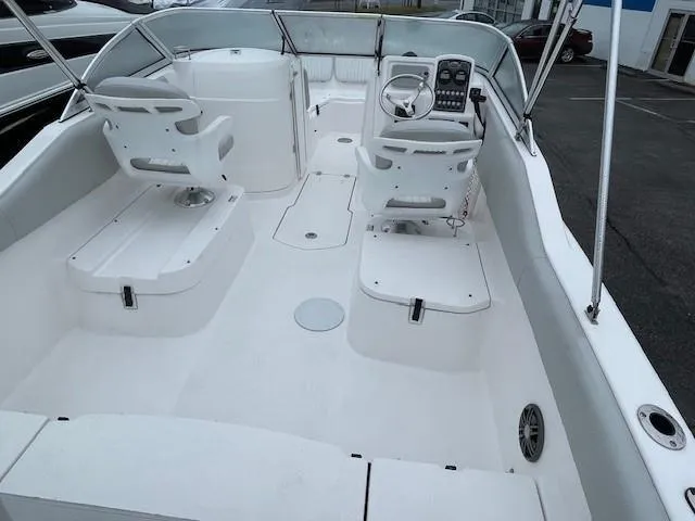 Slide: The Image of 2022 Sea Fox 226 Traveler boat interior with dual seats and steering console. - 12