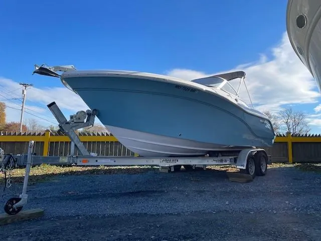 Slide: The Image of 2022 Sea Fox 226 Traveler boat on trailer under clear blue sky. - 3