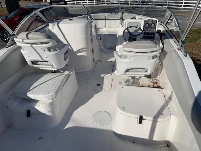 Slide: The Image of 2022 Sea Fox 226 Traveler boat interior with seating and control panel. - 9