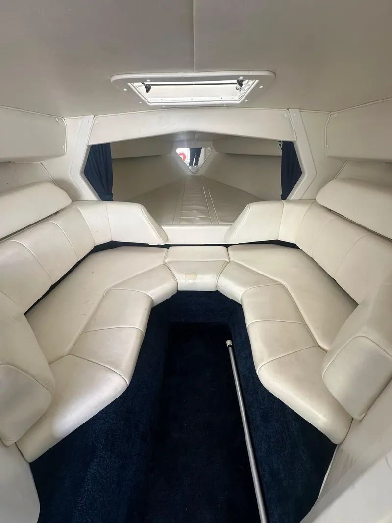 Slide: The Image of Interior of 2003 Fountain 35 Executioner boat with white leather seating. - 11