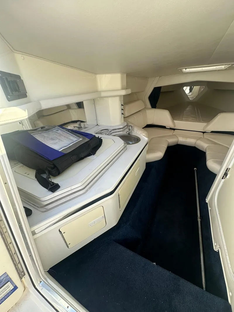 Slide: The Image of Interior of 2003 Fountain 35 Executioner boat with seating and storage. - 12