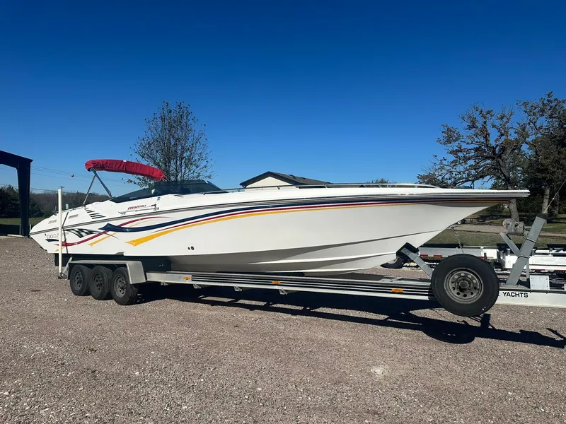 Slide: The Image of 2003 Fountain 35 Executioner speedboat on trailer under clear blue sky. - 3