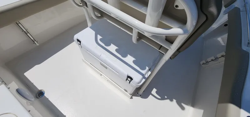 Slide: The Image of 2024 Key West 219fs boat interior with cooler storage under seat. - 36