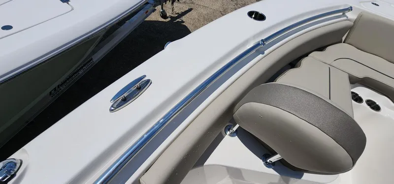 Slide: The Image of 2024 Key West 219fs boat interior with sleek seating and chrome details. - 40