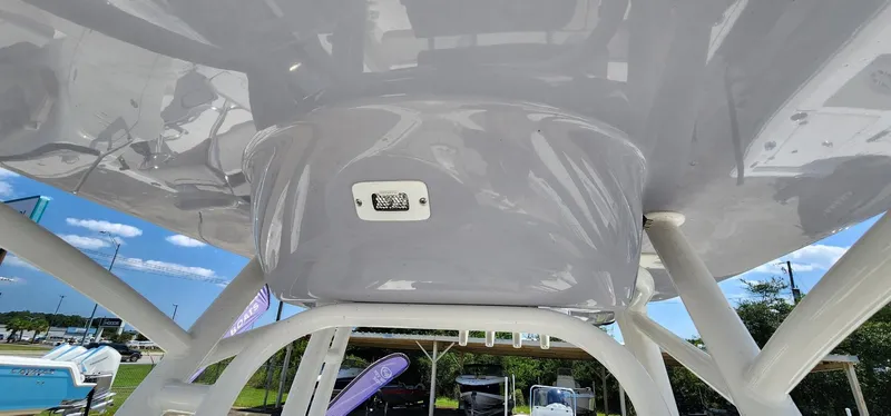 Slide: The Image of 2024 Key West 219fs boat canopy with integrated light, viewed from below. - 42