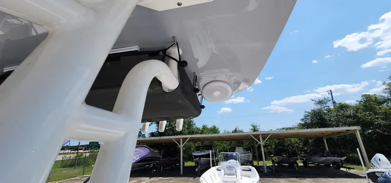 Slide: The Image of 2024 Key West 219fs boat detail, showcasing underside and outdoor storage area. - 44