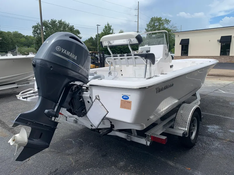 Slide: The Image of 2024 Tidewater 1910BM boat with Yamaha outboard motor on trailer. - 11
