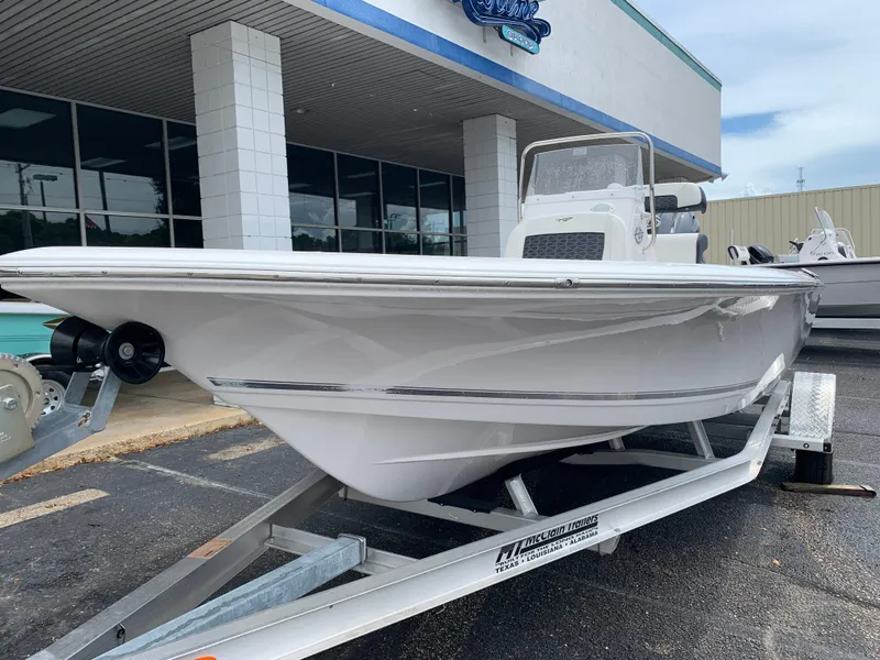 Slide: The Image of 2024 Tidewater 1910BM boat on trailer outside dealership. - 5