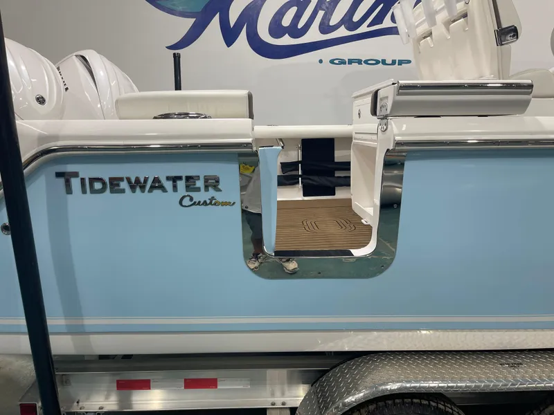 Slide: The Image of 2024 Tidewater 272LXF boat side view with custom detailing. - 15
