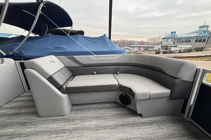 Slide: The Image of 2025 Bennington SX 22 Swingback pontoon boat with spacious seating and modern design. - 18