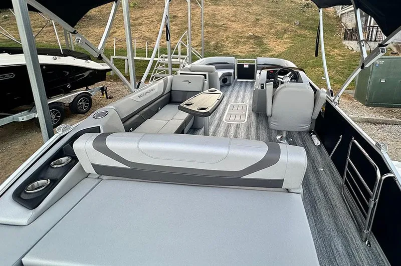 Slide: The Image of 2025 Bennington SX 22 Swingback pontoon boat interior with modern seating and sleek design. - 6