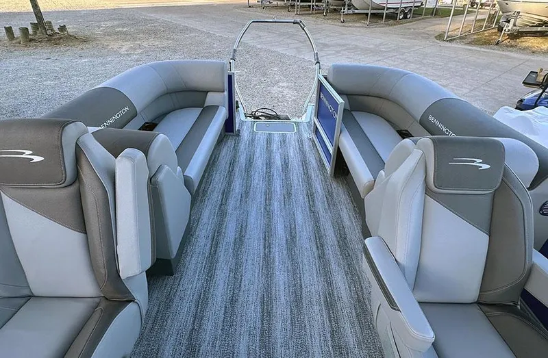 Slide: The Image of 2025 Bennington 21 S STERN RADIUS pontoon boat interior with gray seating and carpet. - 7