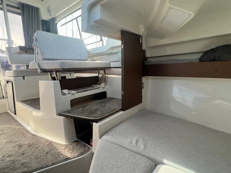 Slide: The Image of Interior of 2022 Jeanneau NC 795 S2 boat with seating and storage. - 30