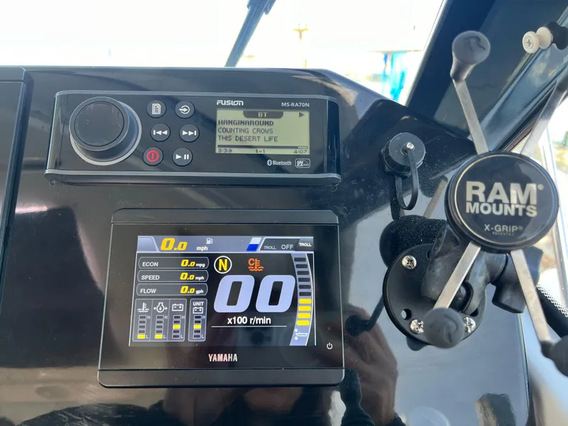 Slide: The Image of Dashboard of 2022 Jeanneau NC 795 S2 with Yamaha display and Fusion audio system. - 43