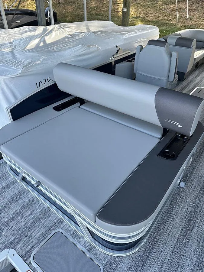 Slide: The Image of 2025 Bennington 22 S Swingback pontoon boat with sleek seating and modern design. - 5