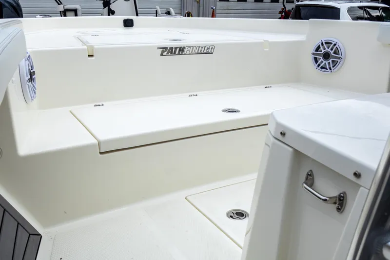 Slide: The Image of 2025 Pathfinder 2400 Open boat interior with seating and speaker. - 18
