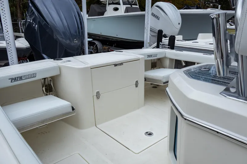 Slide: The Image of 2025 Pathfinder 2400 Open boat interior with seating and storage. - 24