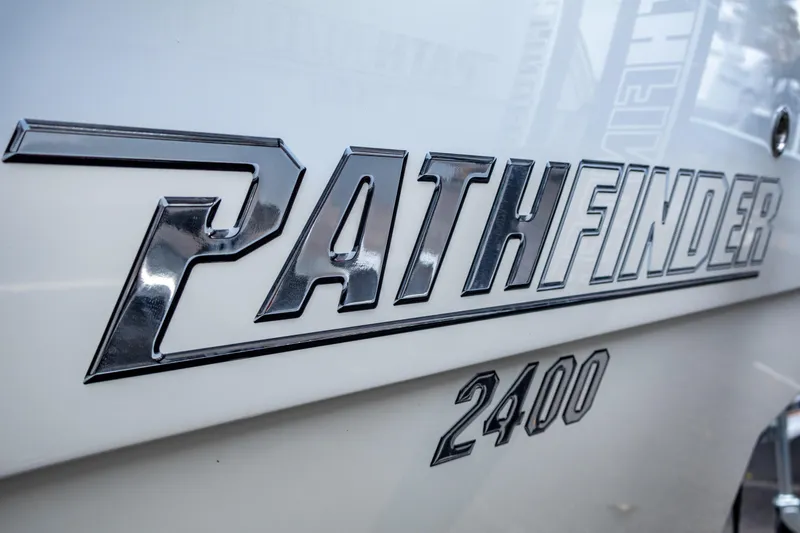 Slide: The Image of 2025 Pathfinder 2400 Open boat logo in chrome lettering. - 7